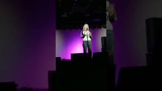 Live performance at open mic spoken word poetry slam