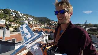 Flying a custom made R/C place from the rooftop of the SGL HQ.