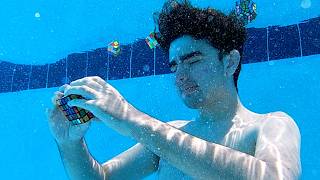 How Many Rubik's Cubes Can You Solve Underwater?