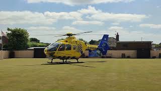 North West Air Ambulance on the Bowling Green at Knott End on Sea, Lancashire FY6.