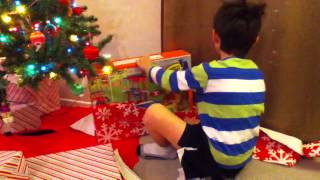 Antonio Opens Gifts from Santa 2012