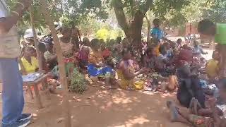 Njema farmers singing in celebration of Tiyeni's work