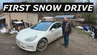 Electric Car Drives Through First Snowfall