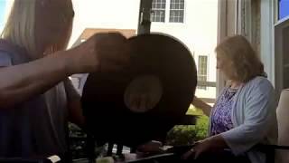 Women Discussing Stuff:  Vintage Record Players