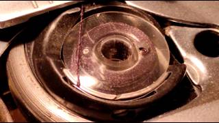 Correct Singer drop-in bobbin case threading