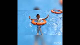 SWIMMING TIME AT POOL.