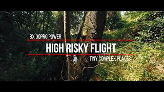 High risky cinematic FPV flight into tiny gaps on a small river