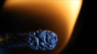 Light match with laser - slow motion