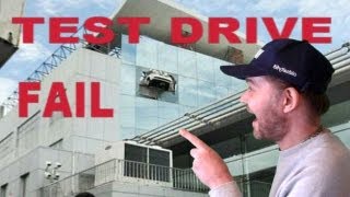 Car Suspended Out Of 4th Floor Window After Test Drive