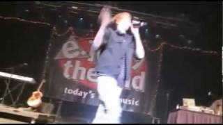 Justin Bieber gets a water bottle in the face