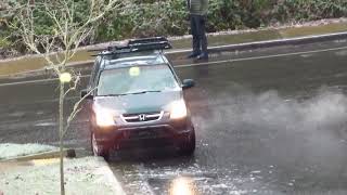 Car tries and fails to drive on ice