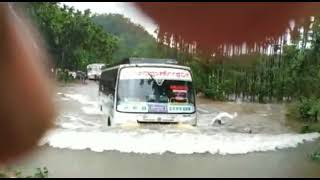 Heavy rain in chikmangalore and bus driver is crossing bridge