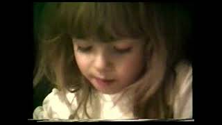 Video 25_1992: Dana and Lee reading to Katie and Tina, Lee braids Katie's hair