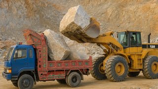 World's Biggest Loader vs. 10,000 LEGO Bricks