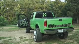 FORD-250 DOORS PUMPIN OUT SOME MIDBASS TO YOUNG DOLPHS-BLU BOYZ