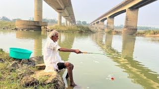 Fishing Video || Under the two bridges grandfather is fishing in the village river with a hook