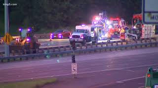 Overturned semi-truck spills chicken feathers all over I-5
