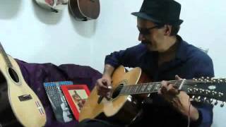 Testing solid top 12-string guitar by Jay Bee Rodríguez