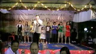 Family Appreciation Day 2009 - Tony Ng with SJSDS children sang "Ehipassiko"