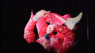 Elvis Presley laying on the Stage in Richmond 1972