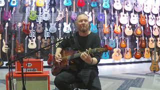 Stunning Emerald Carbon Fiber Guitar