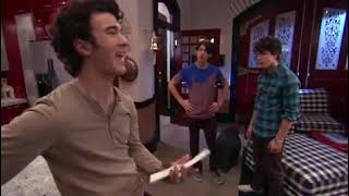 Jonas tv show keeping it real, trying to take out the garbage