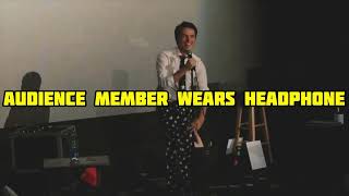 Magic for Adults: Audience Member Wears Headphone