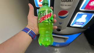 Buying a soda from a small vending machine
