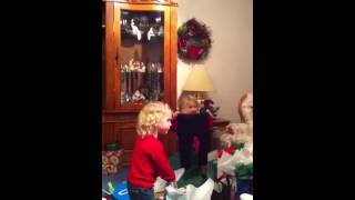 Gracie opening gifts