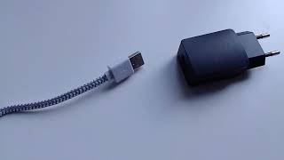 USB cable tries to insert into charger with no help