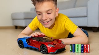 Mark learns car facts with RC racing car