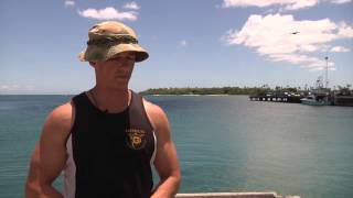 Divers from the U.S. Navy, U.S. Coast Guard, and Australia at U.S.S. Arizona Memorial
