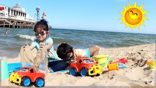 Zara and Rehan playing on the Beach with Sand and other Kids Toys