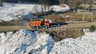 Truck moving around the Building filled with Earth | Stock Footage - Envato elements