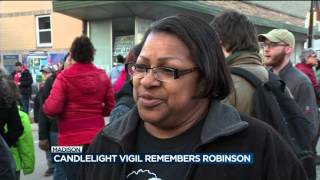 Candlelight vigil remembers Tony Robinson