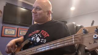 Practicing White Wedding by Billy Idol on bass guitar