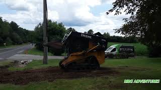 John Deere 319D VS. A Tree Stump