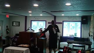 Somebody touched me by Evanglist Dixon 