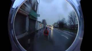 Silly Cyclist Rides on the footway then jumps a red befoe getting dropped