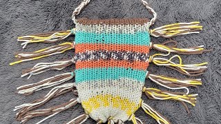 knitting a clutch on the 32 pin mushroom house machine