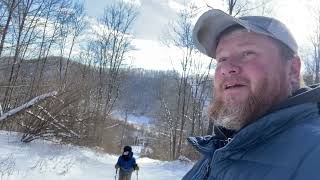 Hiking to an old cemetery after a snow storm. Quality time with my son Mason. ( Donuts in the truck)