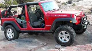 Triple Ledges tackled by 2 Rubicons & 1 FJ in Moab Utah