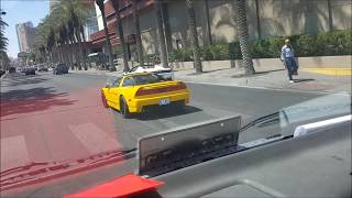 A Customized 2000 Acura NSX and a 2011 Ferrari 458 Spider try to showing off . in Las Vegas