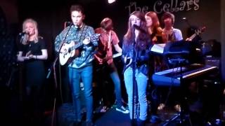Aiden Redshaw with his college band performing 500 miles