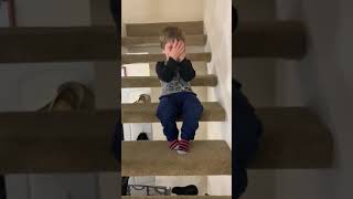 22-month old Sebastian in a mood on the stairs