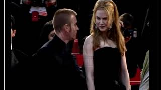 Ewan McGregor and Nicole Kidman pose for pictures at Cannes Premiere for Moulin Rogue.