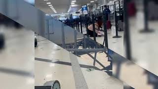 Accidental shooting Atlanta airport (graphic video) (SPOTEMNEWS)