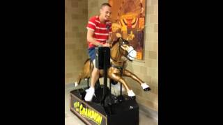Riding a mechanical horse
