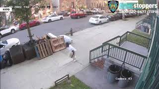 New York lunatic fires a loaded pistol in a crowded neighborhood.USA, Brooklyn