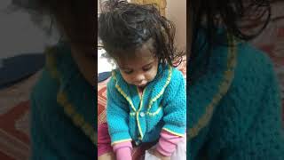 Krisha trying to clean nose